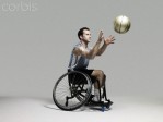 Wheelchair basketball player catching ball