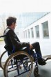 Disabled businessman sitting in a wheelchair