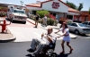 Heart Attack Grill Heart Attack Grill nurse pushing happy quadruple bypass burger patient to his car in a wheelchair